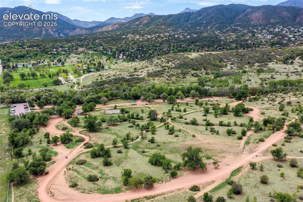 Image 41 of 50: Expansive natural landscape featuring extensive walking paths and varied te