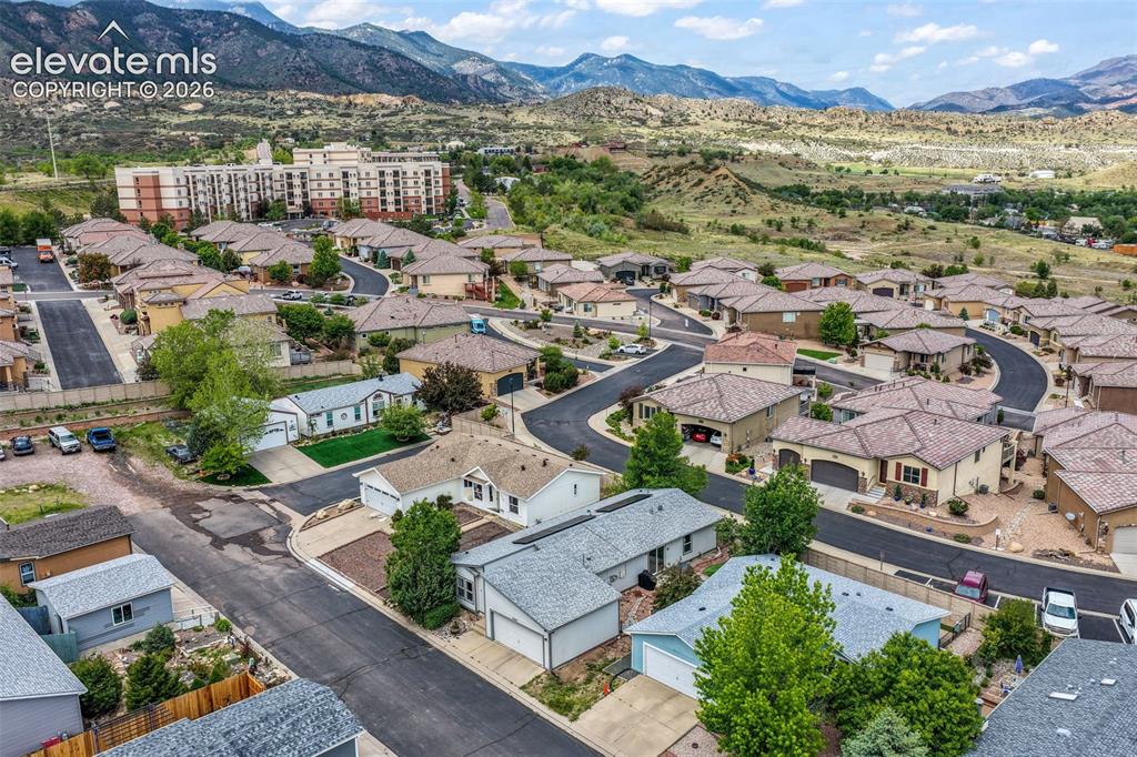 Image 49 of 50: Aerial perspective showcasing a residential community with varied architect