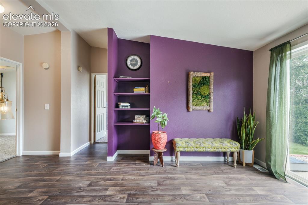 Image 8 of 50: Living room featuring LVP