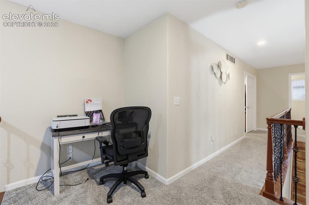 Image 24 of 45: Dedicated alcove featuring an overhead recessed light