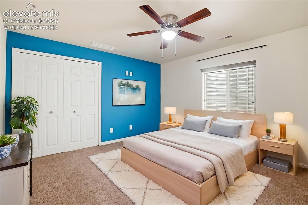 Image 22 of 41: Downstairs bedroom - Virtually Staged