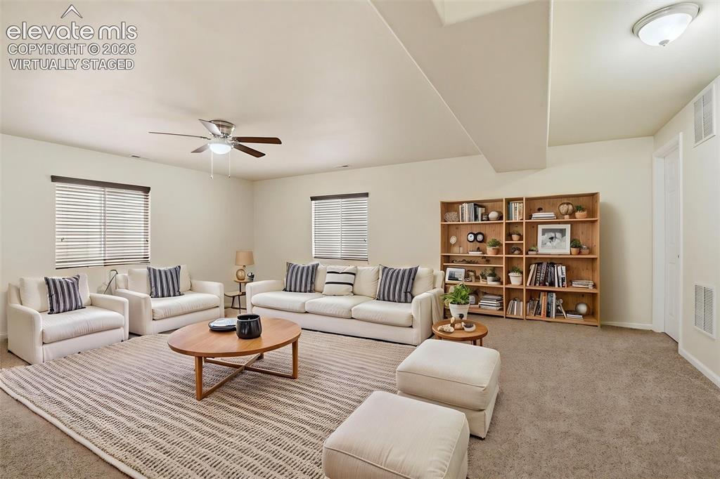 Image 24 of 41: Downstairs family room - Virtually Staged