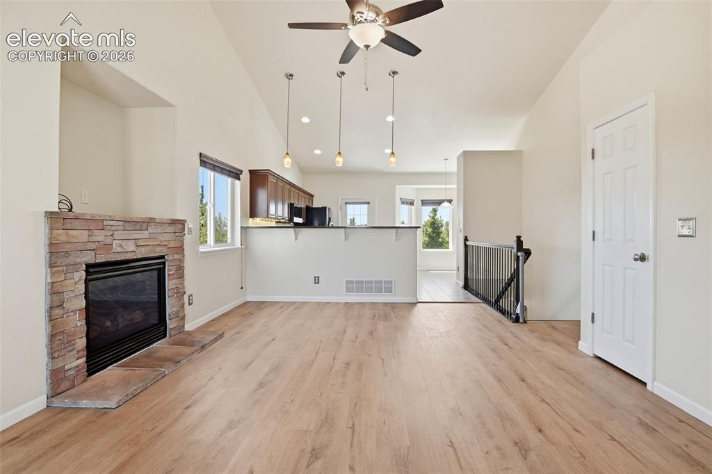 Image 4 of 41: Gas fireplace in the living room