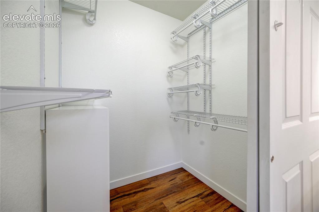 Image 17 of 40: Primary Closet 