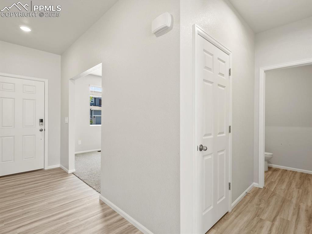 Image 16 of 44: Entryway featuring light wood-type flooring and recessed lighting