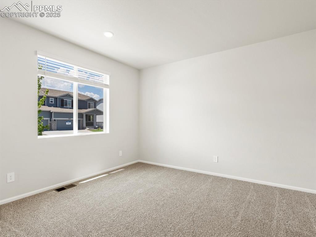 Image 31 of 44: Carpeted empty room featuring baseboards and recessed lighting