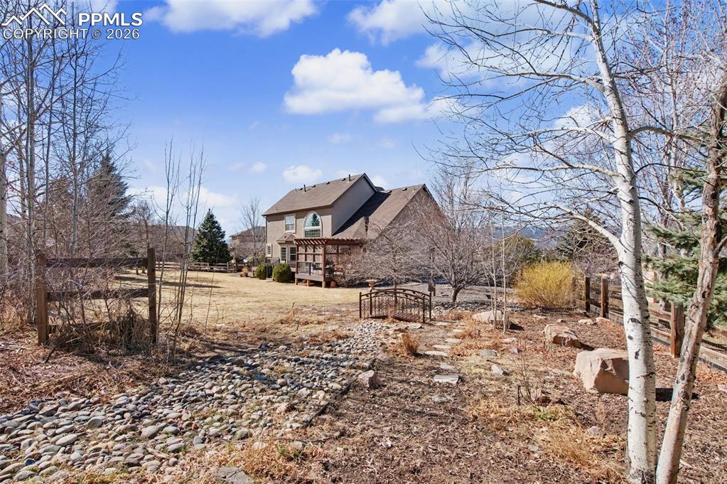 Image 36 of 48: Expansive Park Like Backyard!