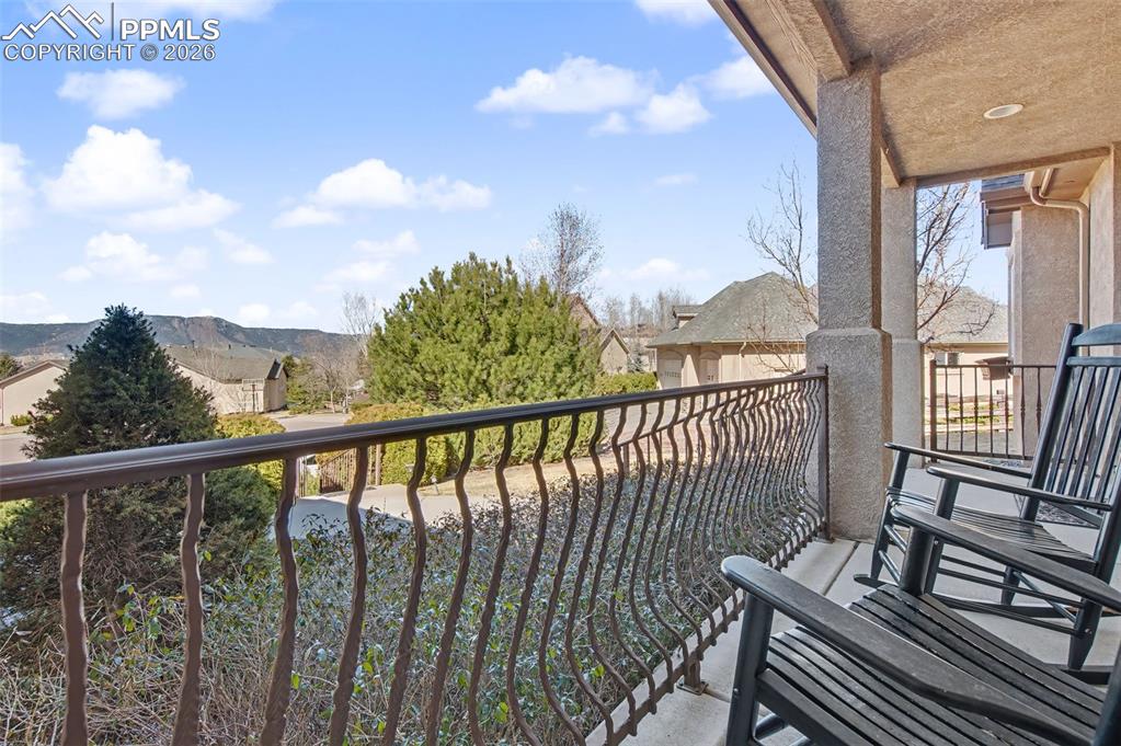 Image 42 of 48: Covered Front Porch with Mountain Views!