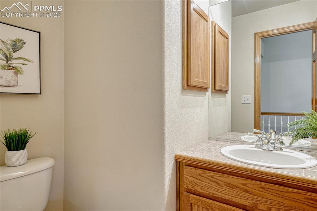 Image 17 of 48: This main-level laundry room comes with electric hook-ups and provides incr