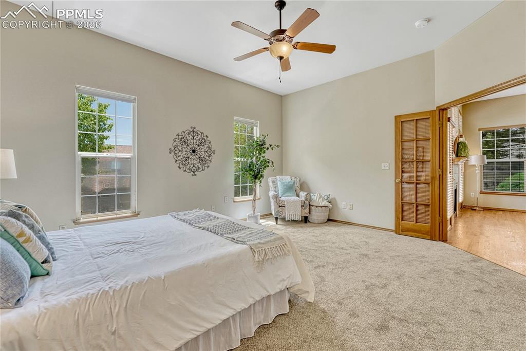 Image 18 of 48: The main level includes a convenient half-bathroom with a charming tile van