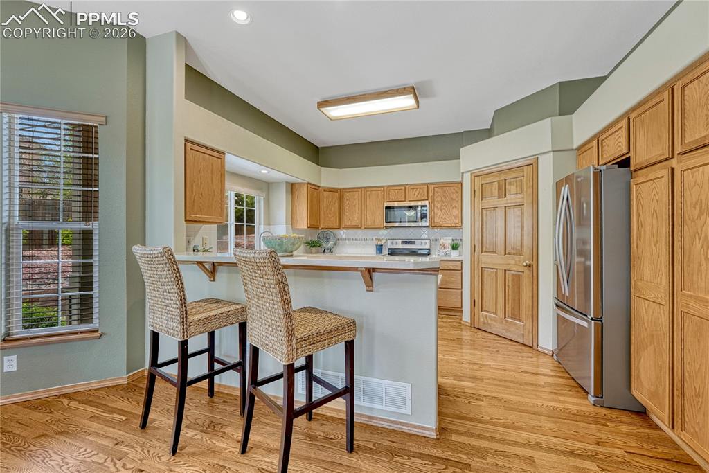 Image 9 of 48: The open dining and living space provides plenty of room for hosting friend