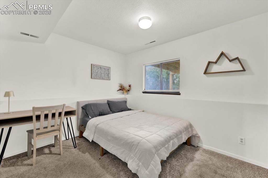 Image 23 of 48: Bedroom