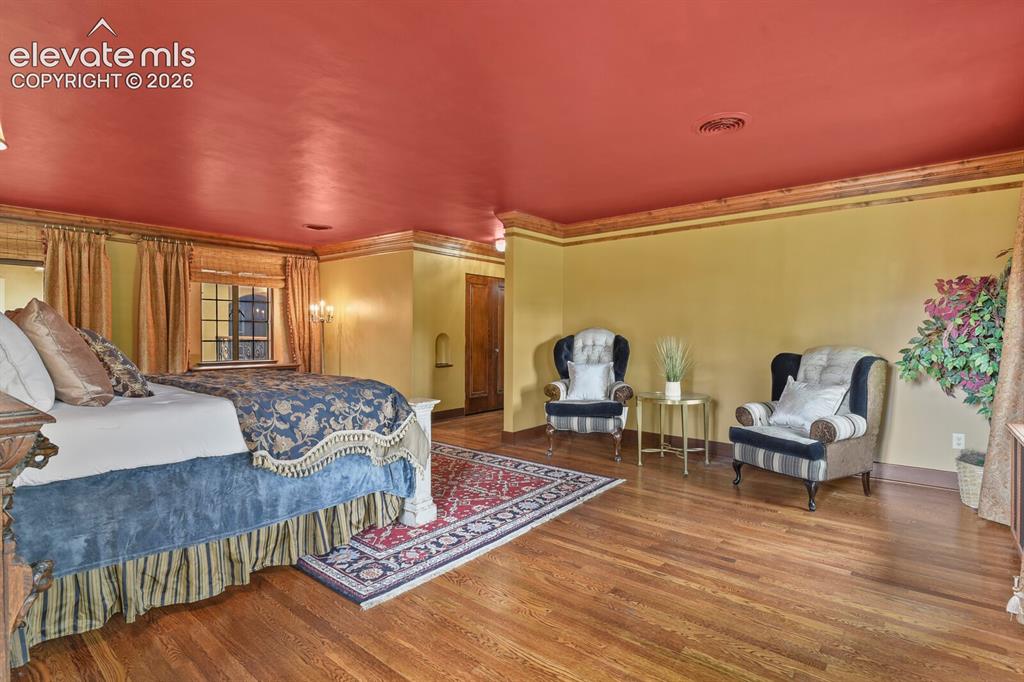 Image 30 of 50: Master Bedroom