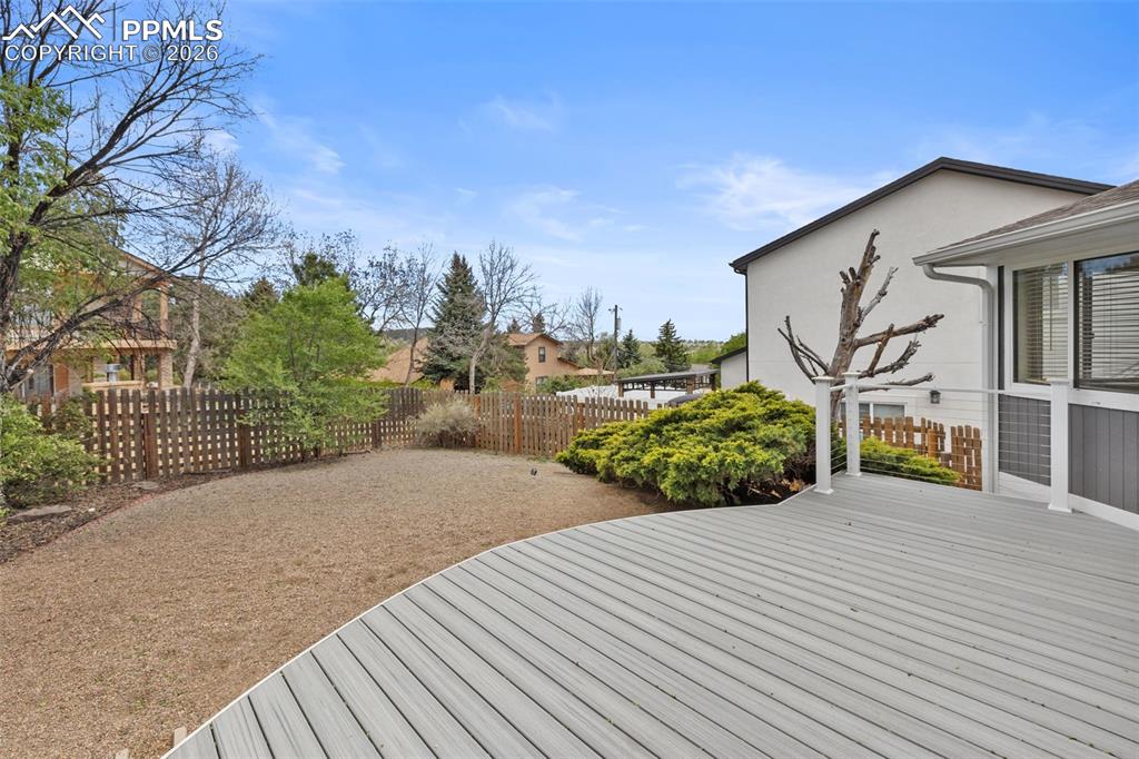 Image 37 of 48: Back yard deck