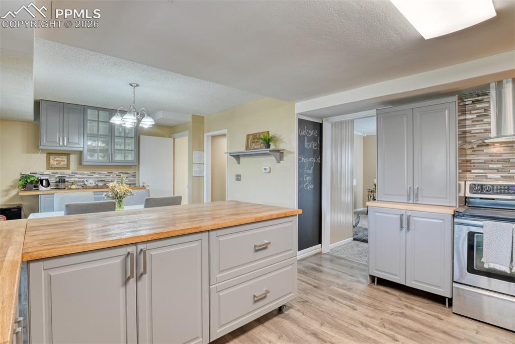 Image 10 of 38: Lots of storage...this main piece with two doors and drawers is on wheels a