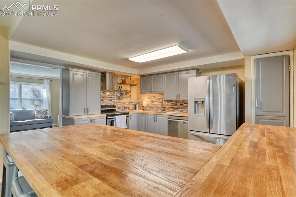 Image 12 of 38: Additional seating space at the counter if desired. 