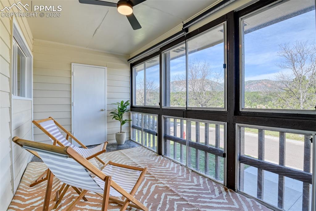 Image 16 of 38: The sunroom has two good sized storage closets. Could make a nice playspace