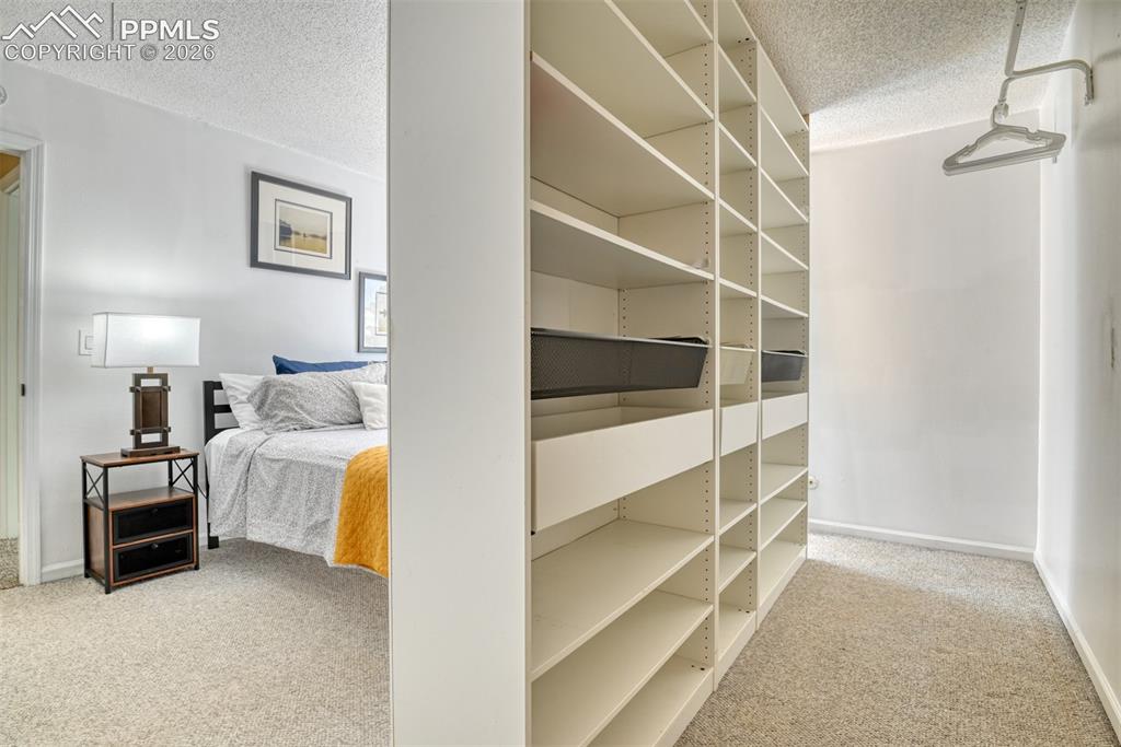 Image 21 of 38: This Ikea unit can be removed completely or moved to the existing closet.