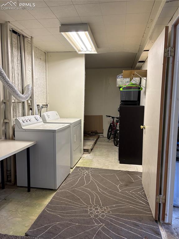 Image 34 of 38: Mudroom is located off the garage...has space for washer & dryer and storag