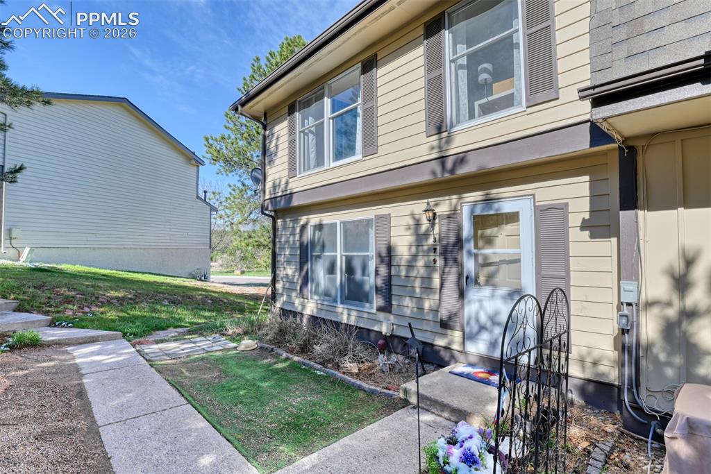 Image 4 of 38: End unit so having only neighbors on one side makes this home special.