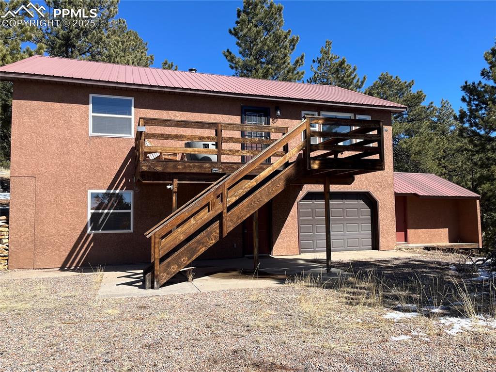 Image 1 of 28: Gorgeous Stucco Mountain Home. Large upper deck with stunning Views facing