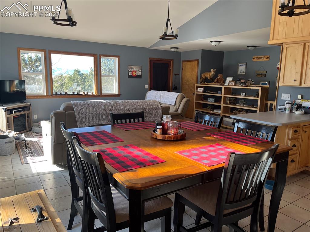 Image 9 of 28: Open concept main level. Eat in kitchen. The views off the front window