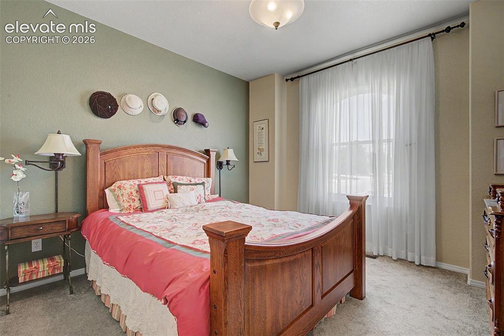 Image 15 of 31: Main level bedroom
