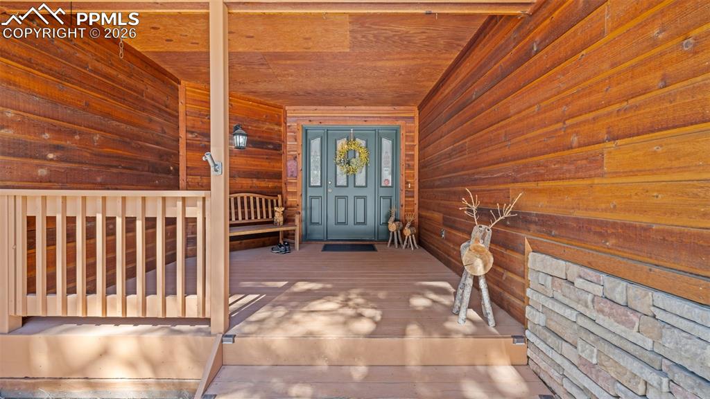 Image 4 of 47: Covered front porch!