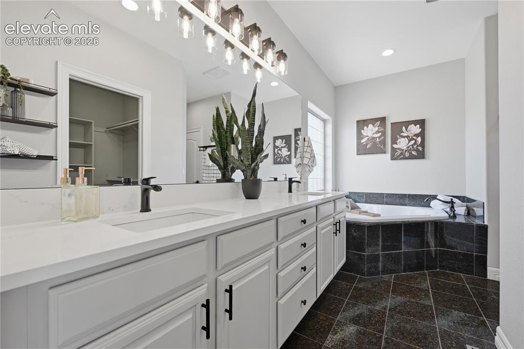 Image 22 of 49: Master Bathroom