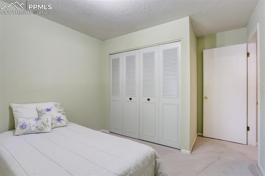 Image 16 of 45: Second bedroom- Main level
