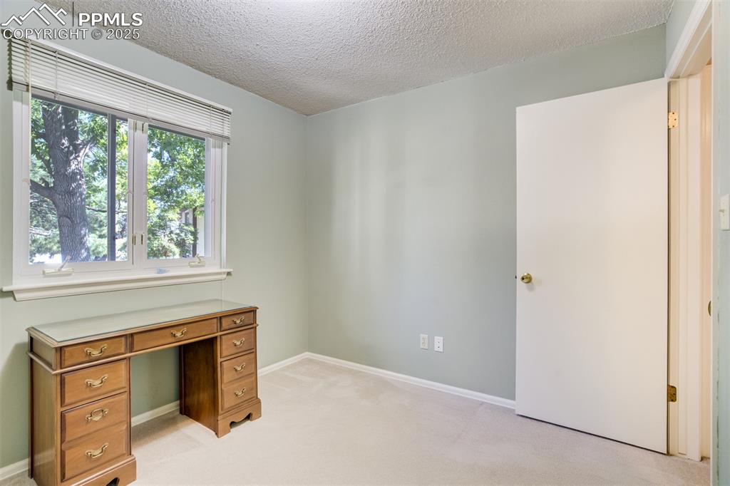 Image 19 of 45: Third bedroom- main level