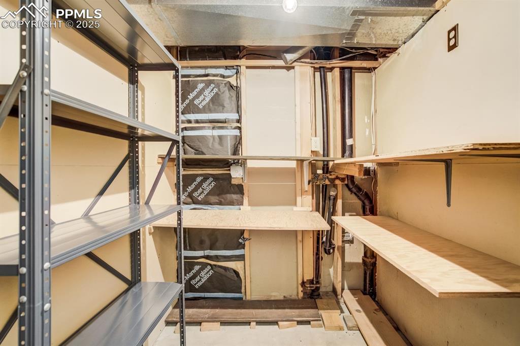 Image 29 of 45: Second laundry room located in basement, laundry chute from main level
