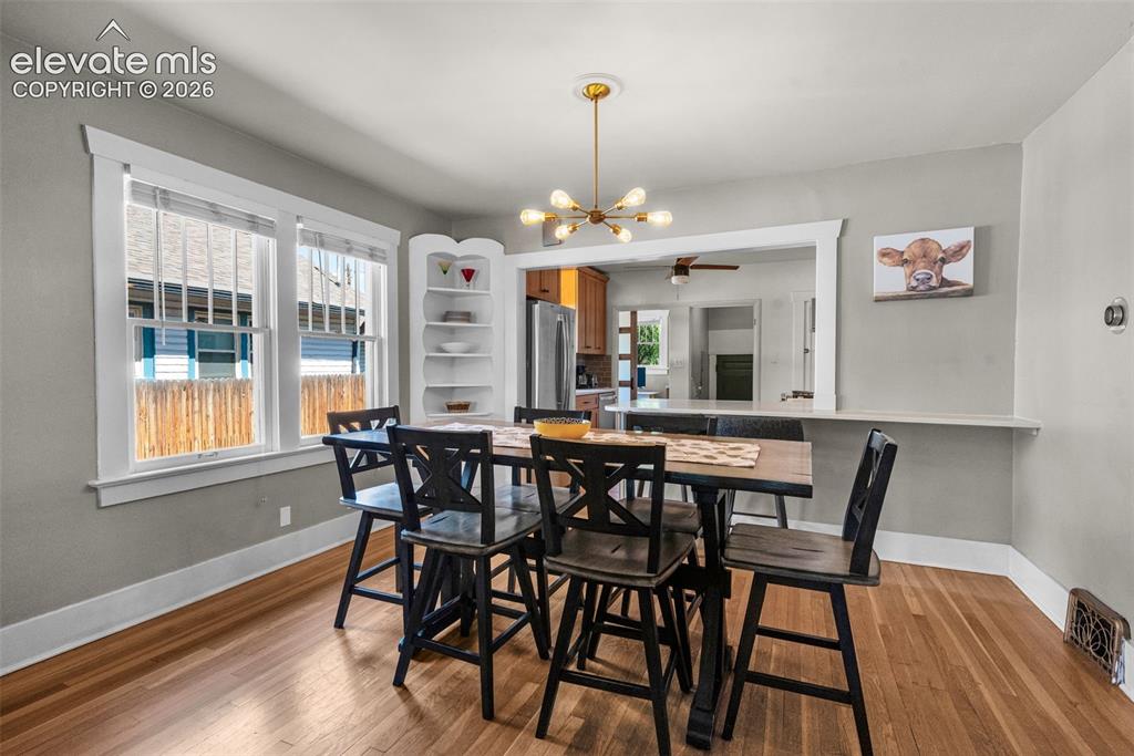 Image 12 of 48: Looking into open kitchen
