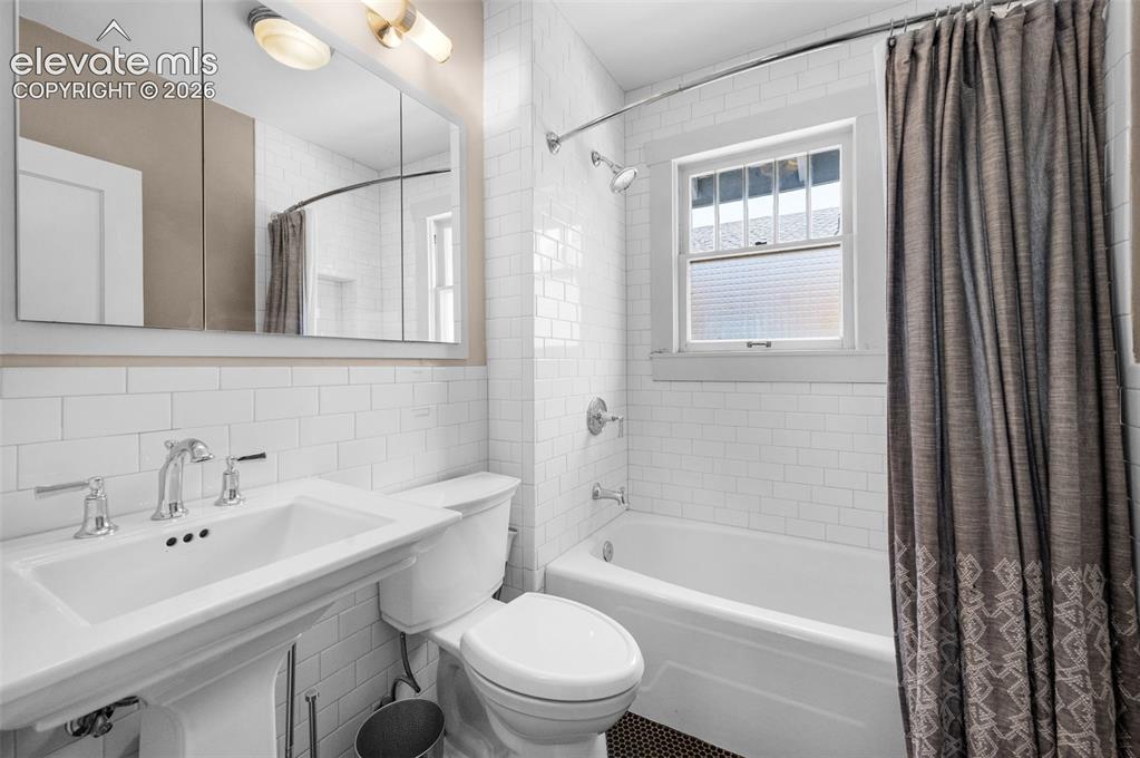 Image 20 of 48: Main level bathroom
