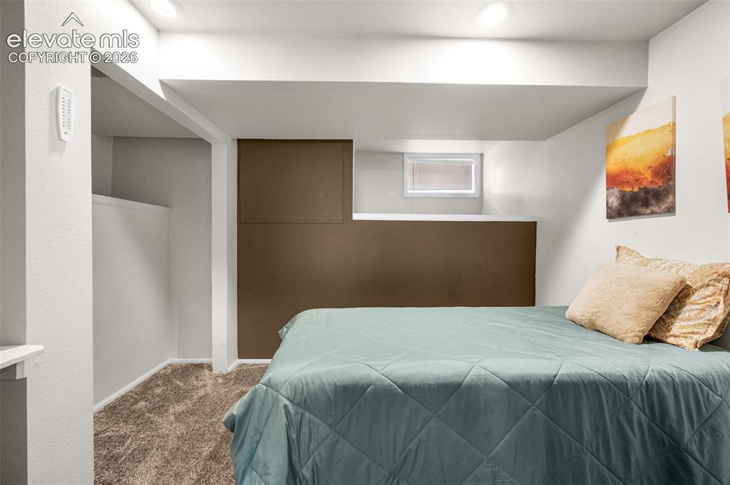 Image 35 of 48: Lower level non-conforming bedroom