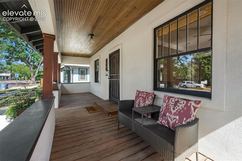 Image 5 of 48: Cozy front porch