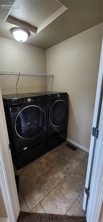 Image 24 of 48: Upstairs Laundry Room
