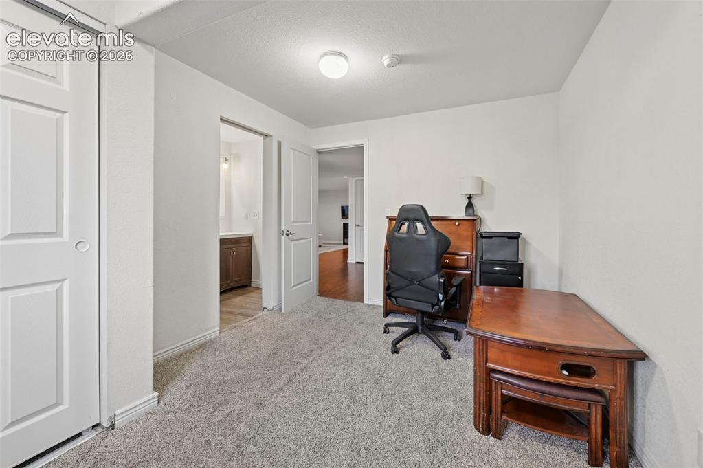 Image 39 of 48: Basement Bedroom