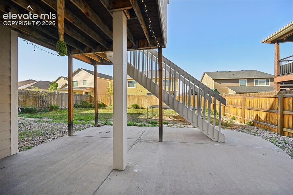 Image 40 of 48: Walk-out Basement patio