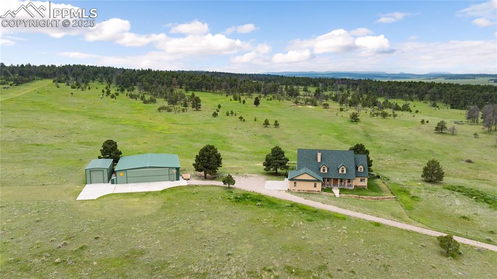 Image 10 of 41: Overview of rural landscape with a heavily wooded area