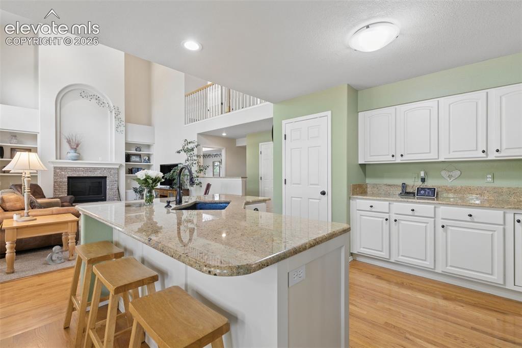 Image 10 of 49: Tons of Cabinets and a Nicely Sized Pantry!