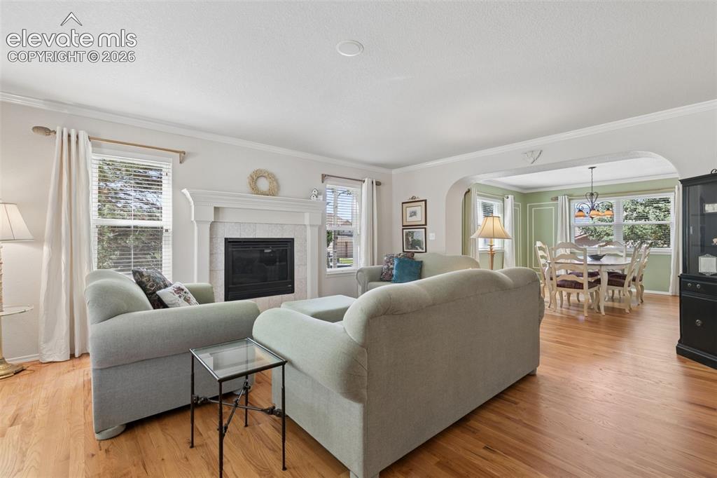 Image 13 of 49: Formal Living Room with Gas Fireplace!