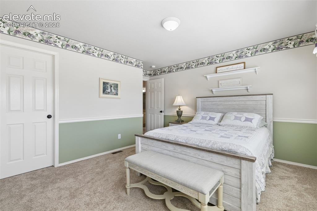 Image 28 of 49: 2nd of 2 Upper Level Bedrooms!