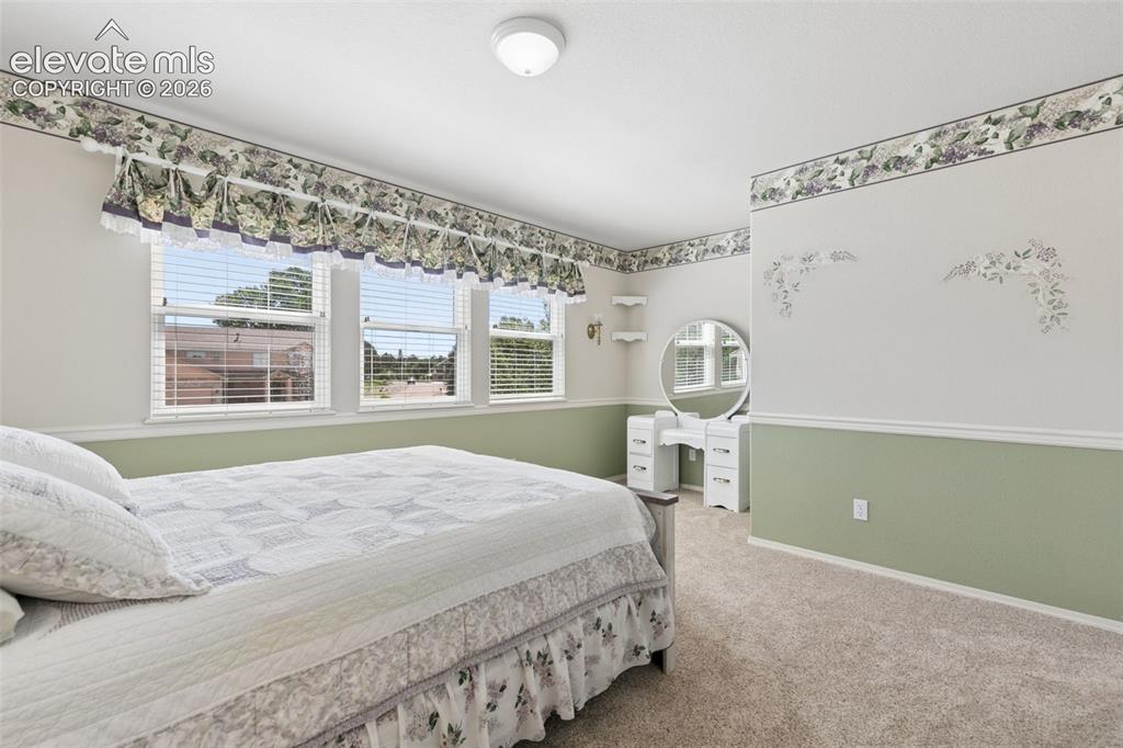 Image 29 of 49: Spacious Upper Level Bedroom!