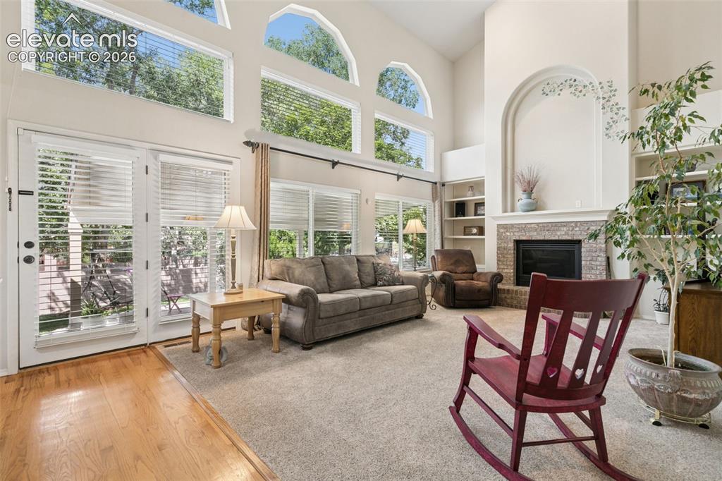 Image 7 of 49: Gas Fireplace and Walk-out Access to the Backyard!
