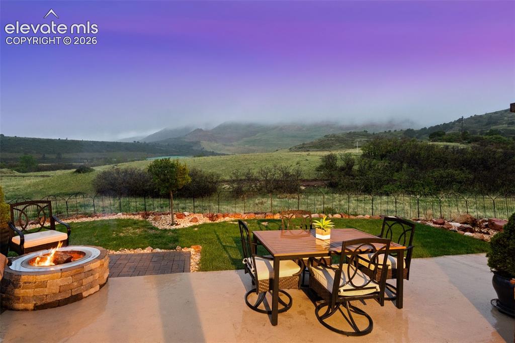 Image 2 of 46: Gather around the firepit for conversation and toasted marshmallows even o