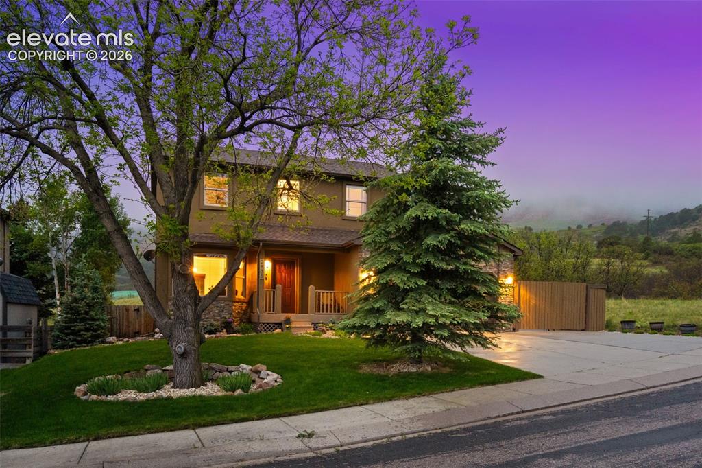Image 9 of 46: Mature Landscaping and great curb appeal