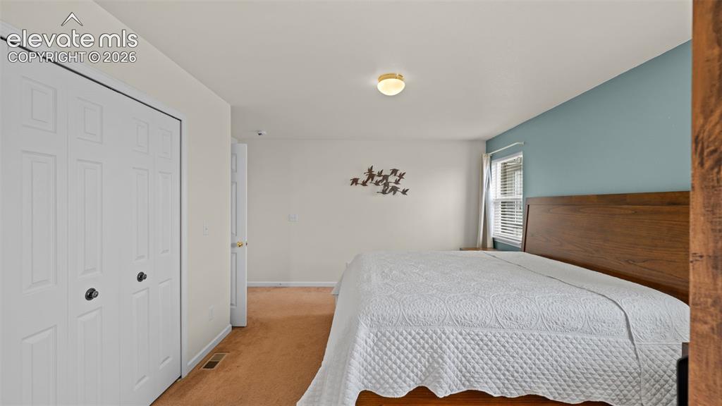 Image 13 of 42: Master Bedroom