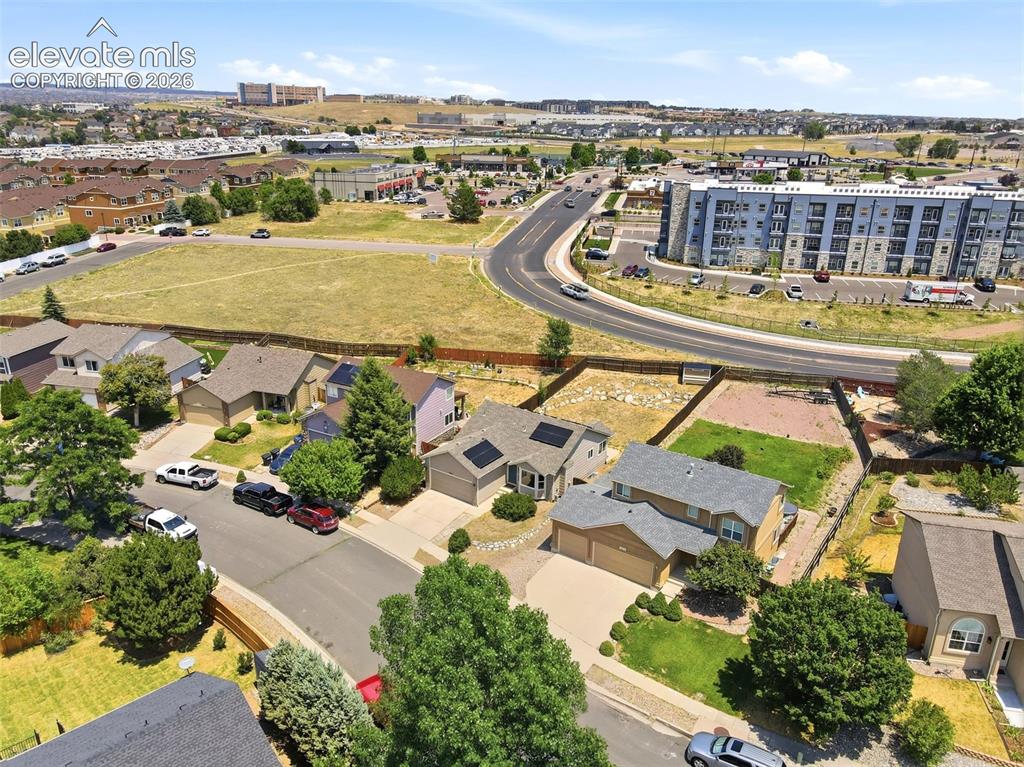 Image 39 of 48: Aerial perspective showcasing a residential neighborhood with varied archit