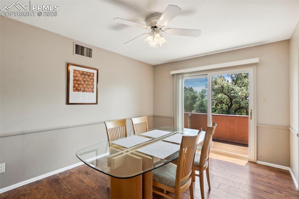 Image 8 of 20: Dining Room with a Walk-Out to the Balcony